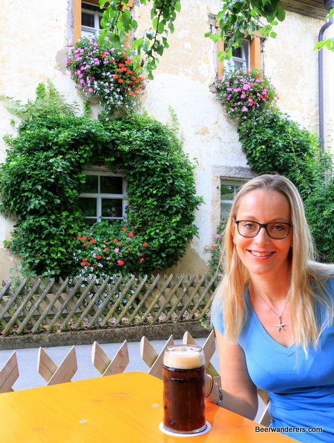 pretty blond with dark beer