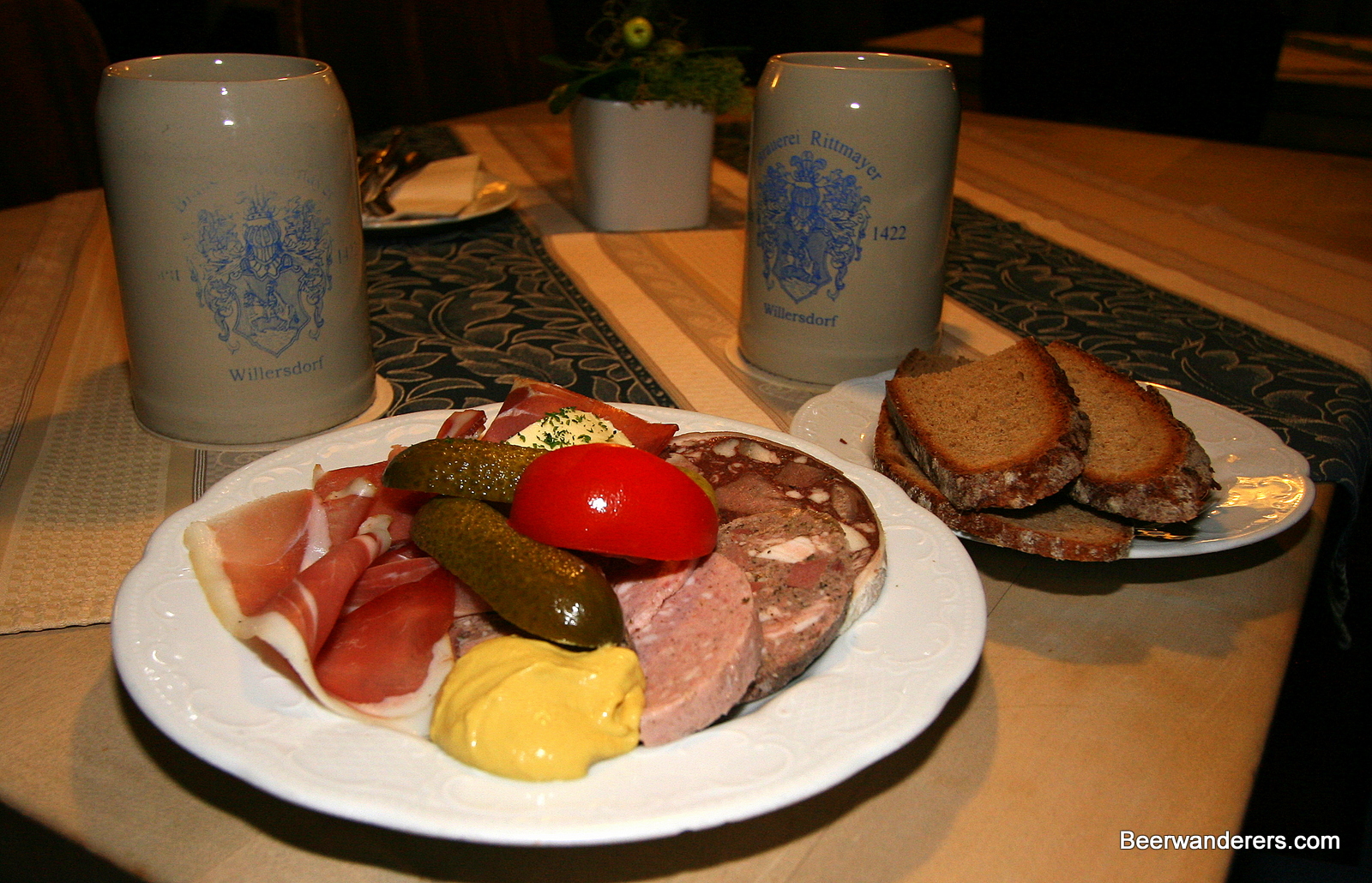 cold cuts on plate with beer