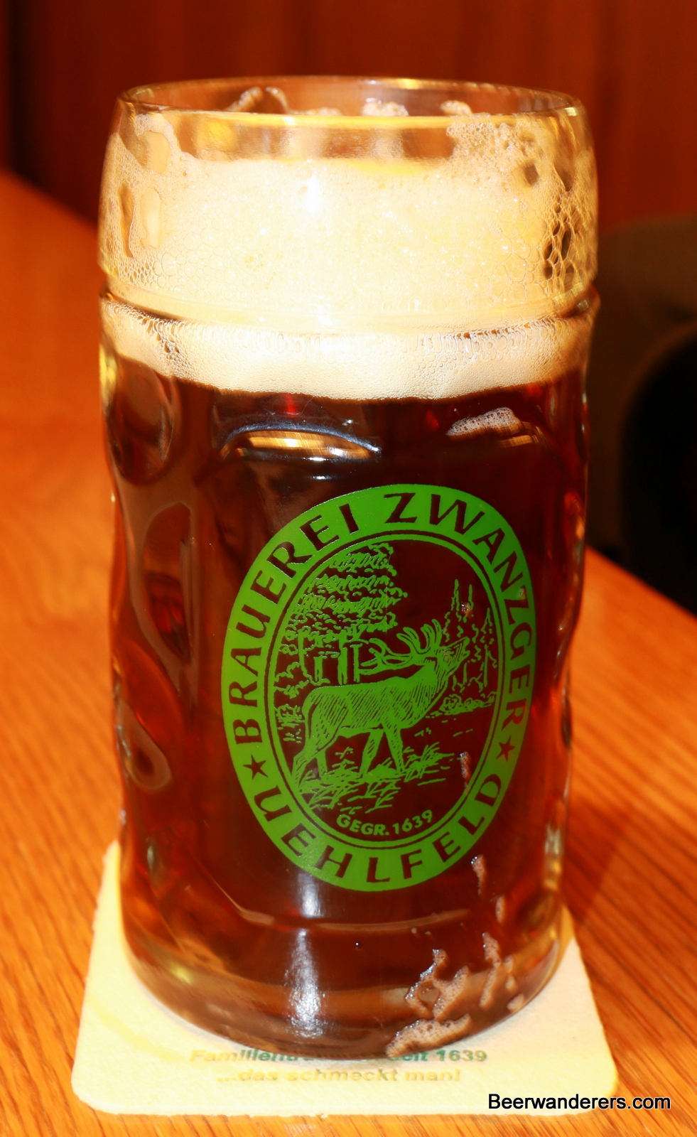unfiltered amber beer in mug