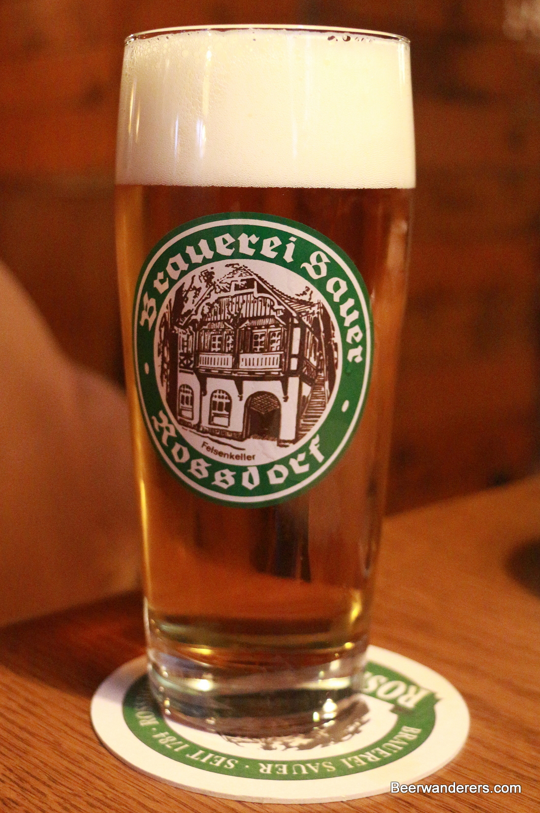 beer in glass with big head