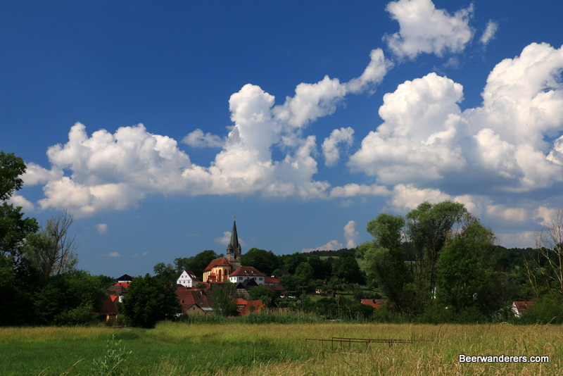 village church across a field
