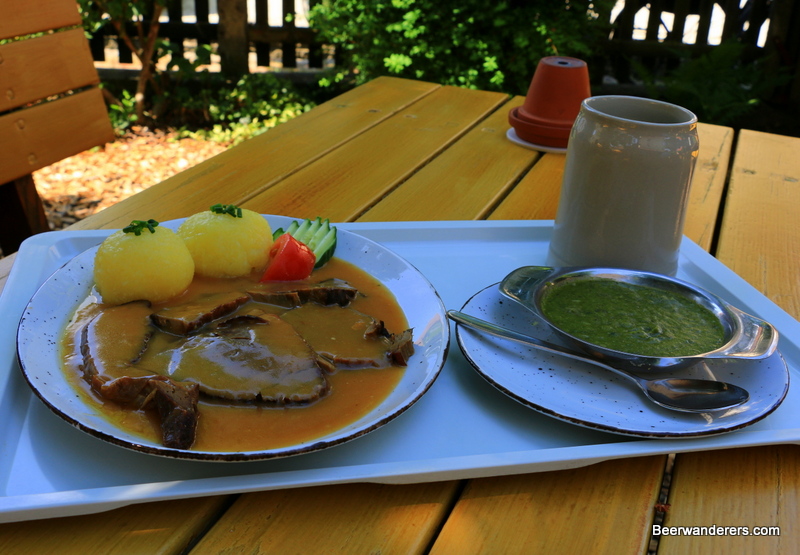 food on tray with beer