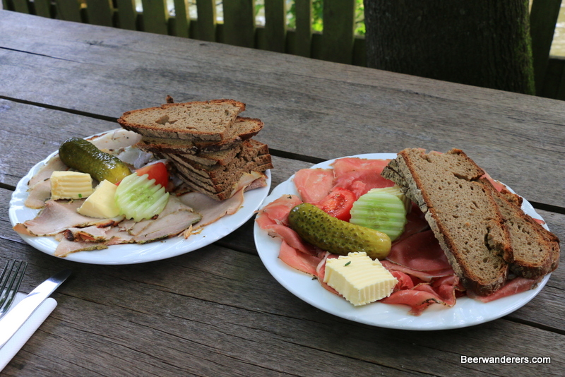 cold cuts with bread on plates