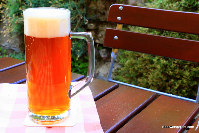 amber beer in mug