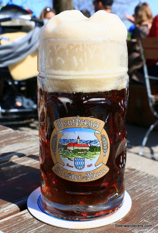 dark beer in mug with huge head
