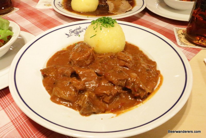 meat in sauce with dumpling