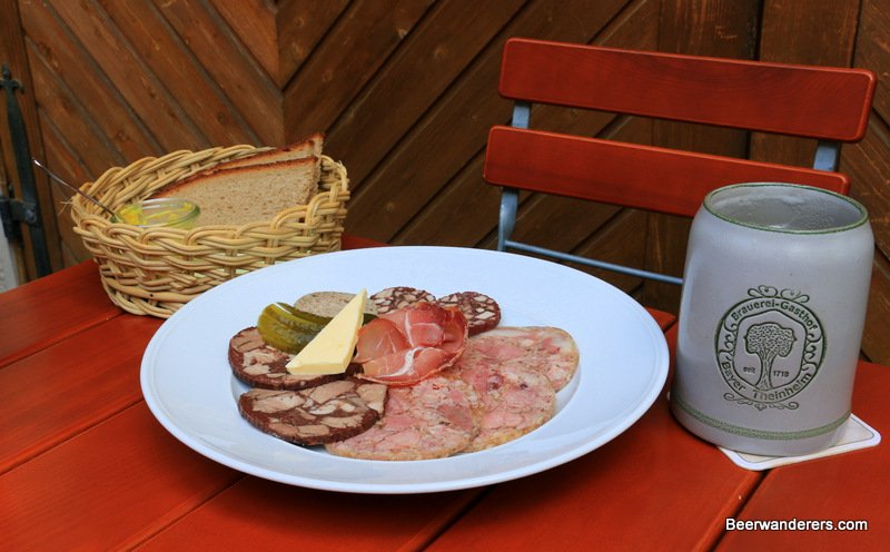 cold cuts on plate with beer