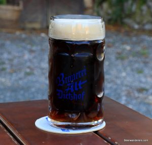 dark beer in logo glass