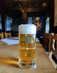 golden beer in logo mug