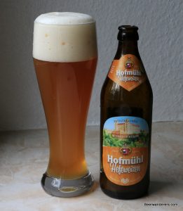 weissbier in glass and bottle