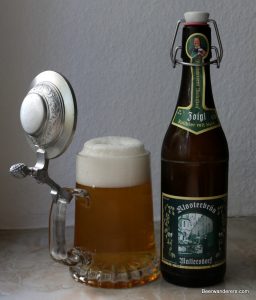 beer in pewter lidded mug with swingtop bottle