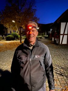 guy with headlamp and red nose