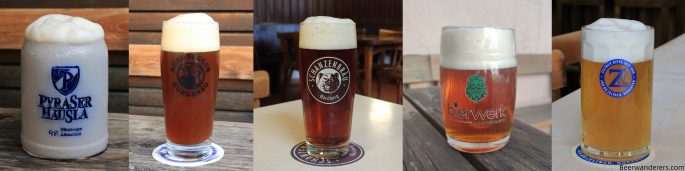 five beers of different colors in logo glasses