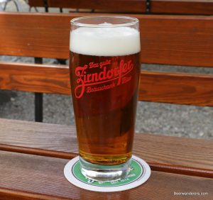 amber beer in logo glass