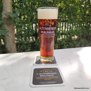amber beer in logo glass